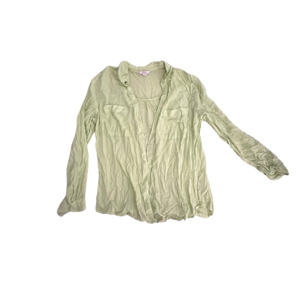 Light green. Buttoned blouse.